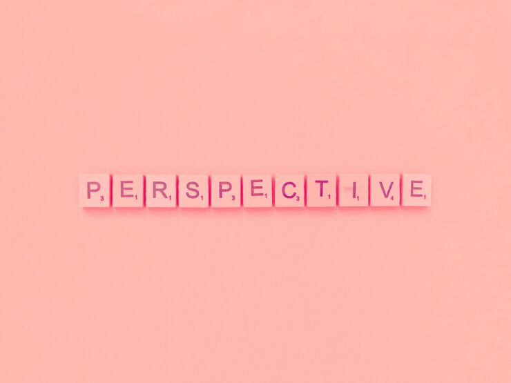 Pink Scrabble tiles spell 