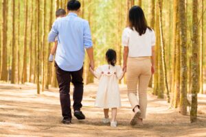 happy family walking together, enjoying lifes simple joys